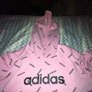 It’s kind of like a hoodie but it’s really big. Says “Adidas”/has a hood